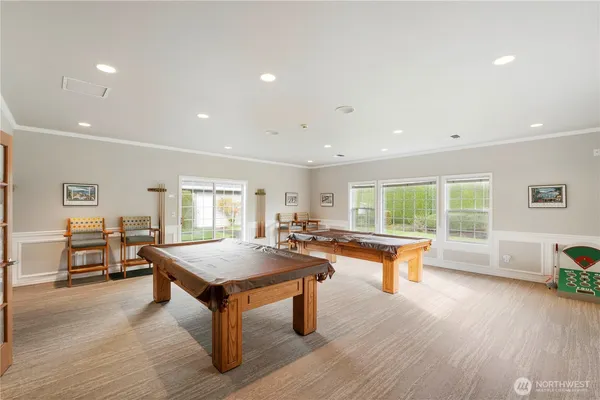an empty room with furniture and a fireplace