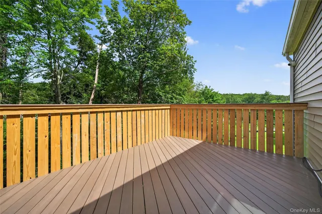 a view of a backyard with wooden floor