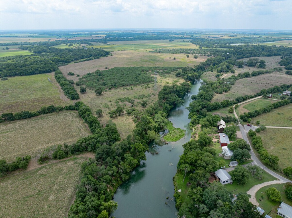 602 Northwest River Road Martindale, TX 78655 - Photo 10 of 13 an aerial view of a houses with outdoor space and trees all around