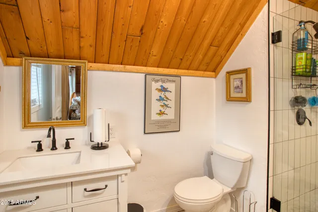 a view of an chairs and table in the balcony