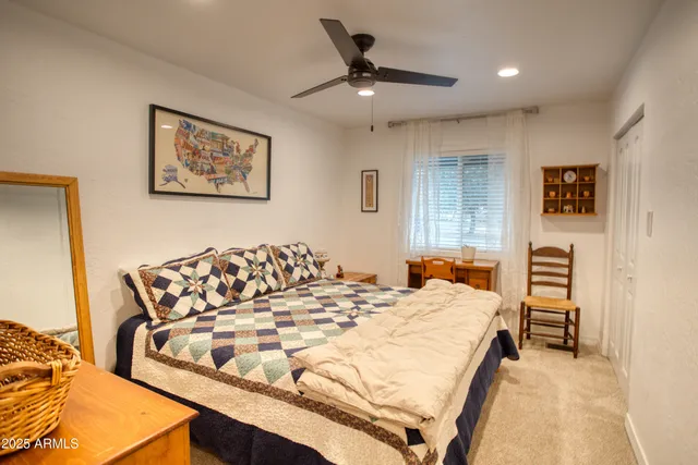 a bathroom with a sink toilet and mirror