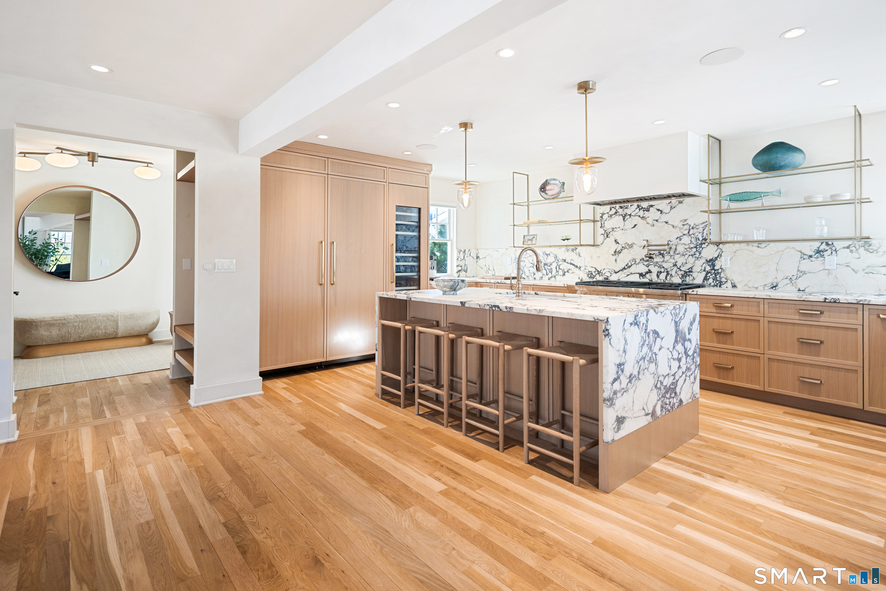 22 Craw Avenue Norwalk, CT 06853 - Photo 12 of 40 a view of kitchen with kitchen island and wooden floor