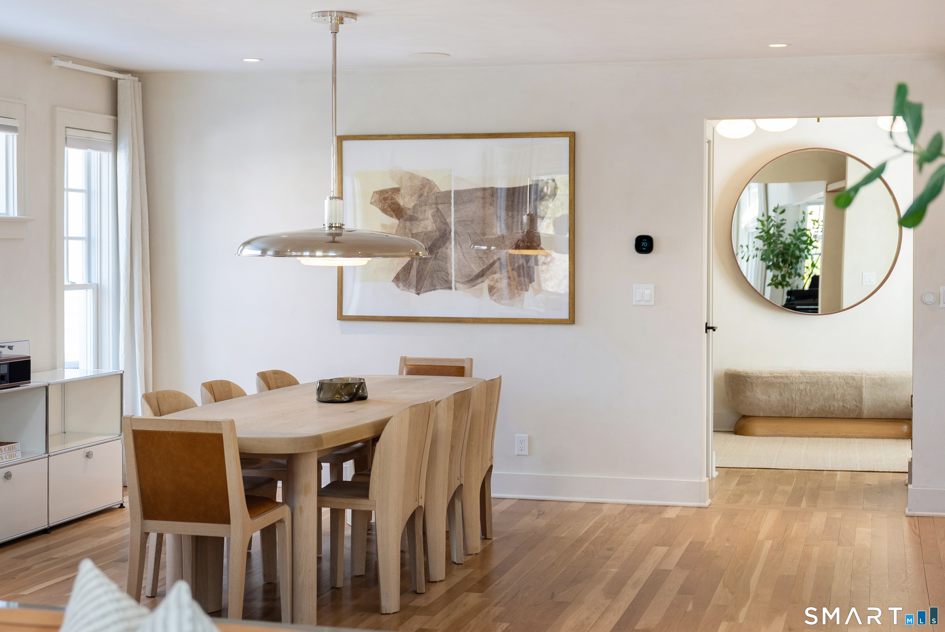 22 Craw Avenue Norwalk, CT 06853 - Photo 16 of 40 a view of a dining room with furniture and wooden floor