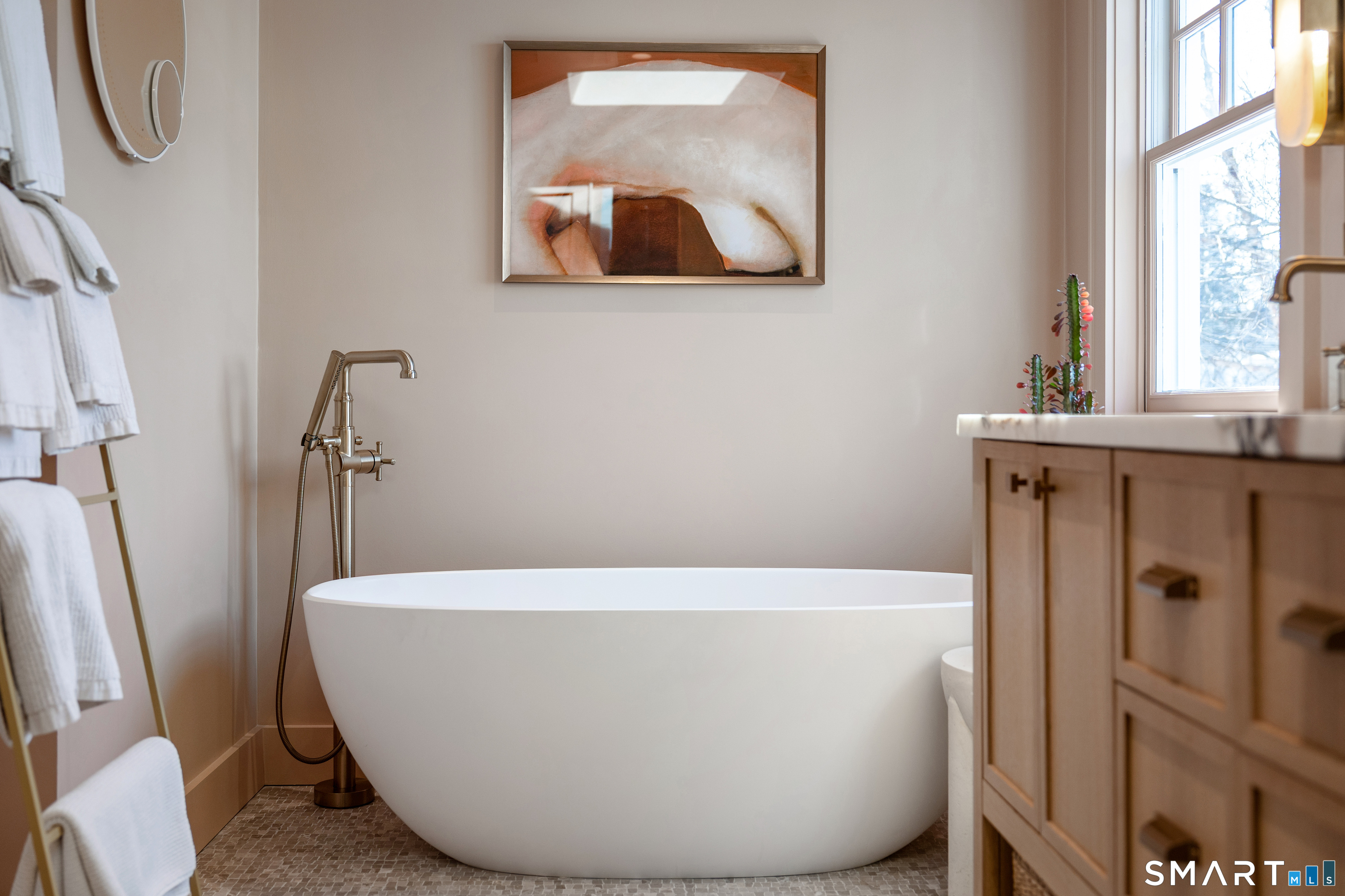 22 Craw Avenue Norwalk, CT 06853 - Photo 26 of 40 a white bath tub sitting in a bathroom