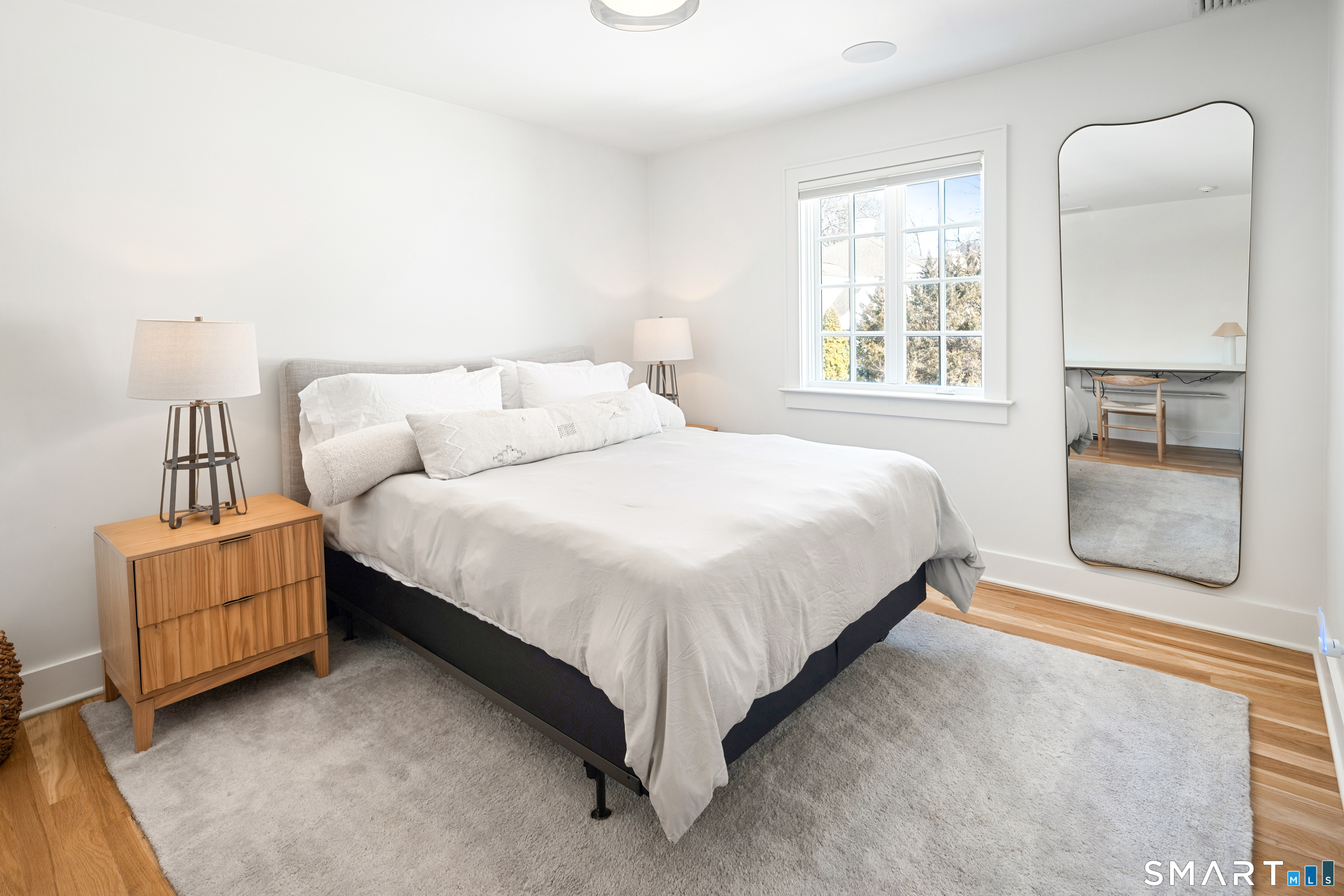 22 Craw Avenue Norwalk, CT 06853 - Photo 29 of 40 a bedroom with a bed and walk in closet