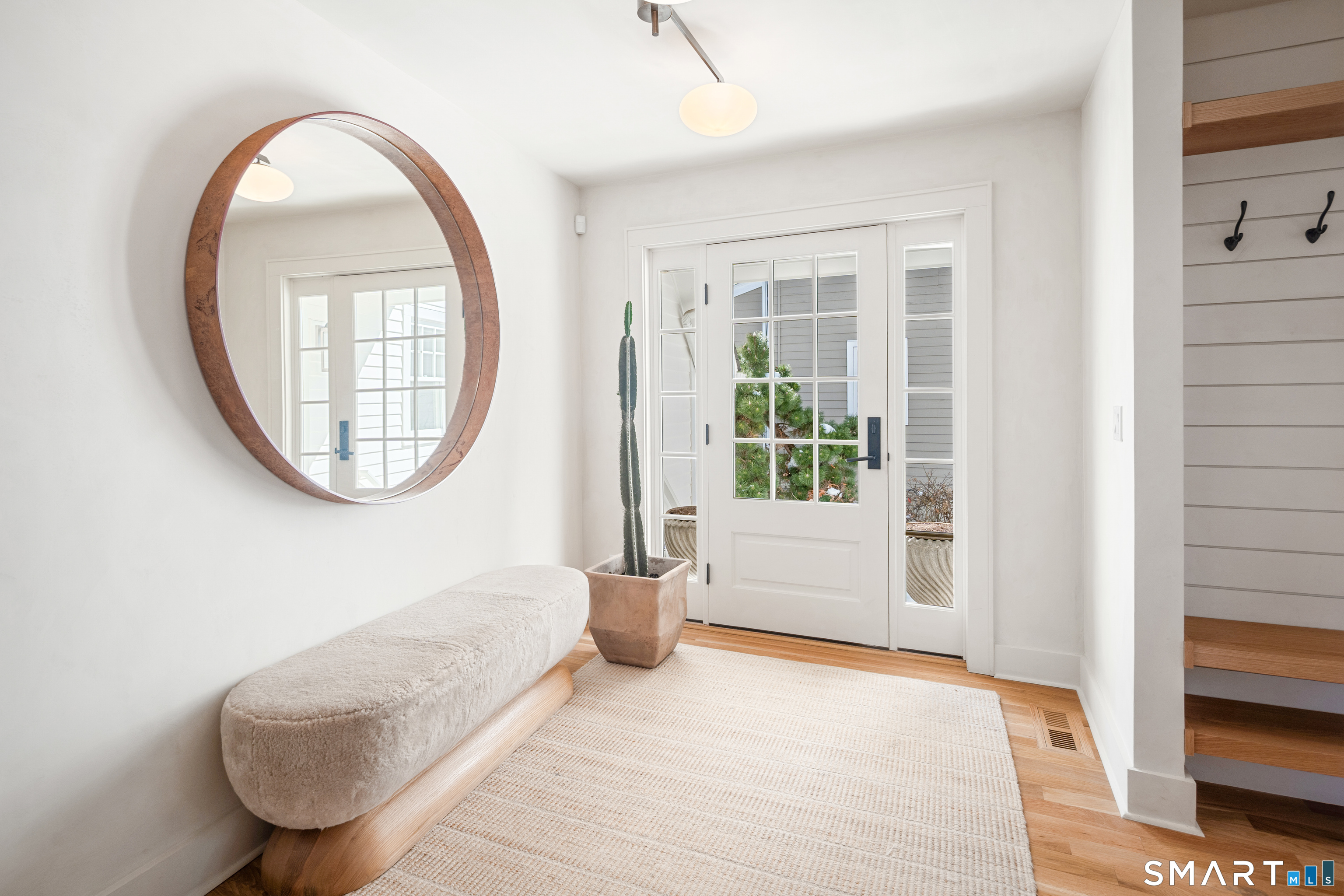 22 Craw Avenue Norwalk, CT 06853 - Photo 3 of 40 a view of a livingroom with furniture and a large window