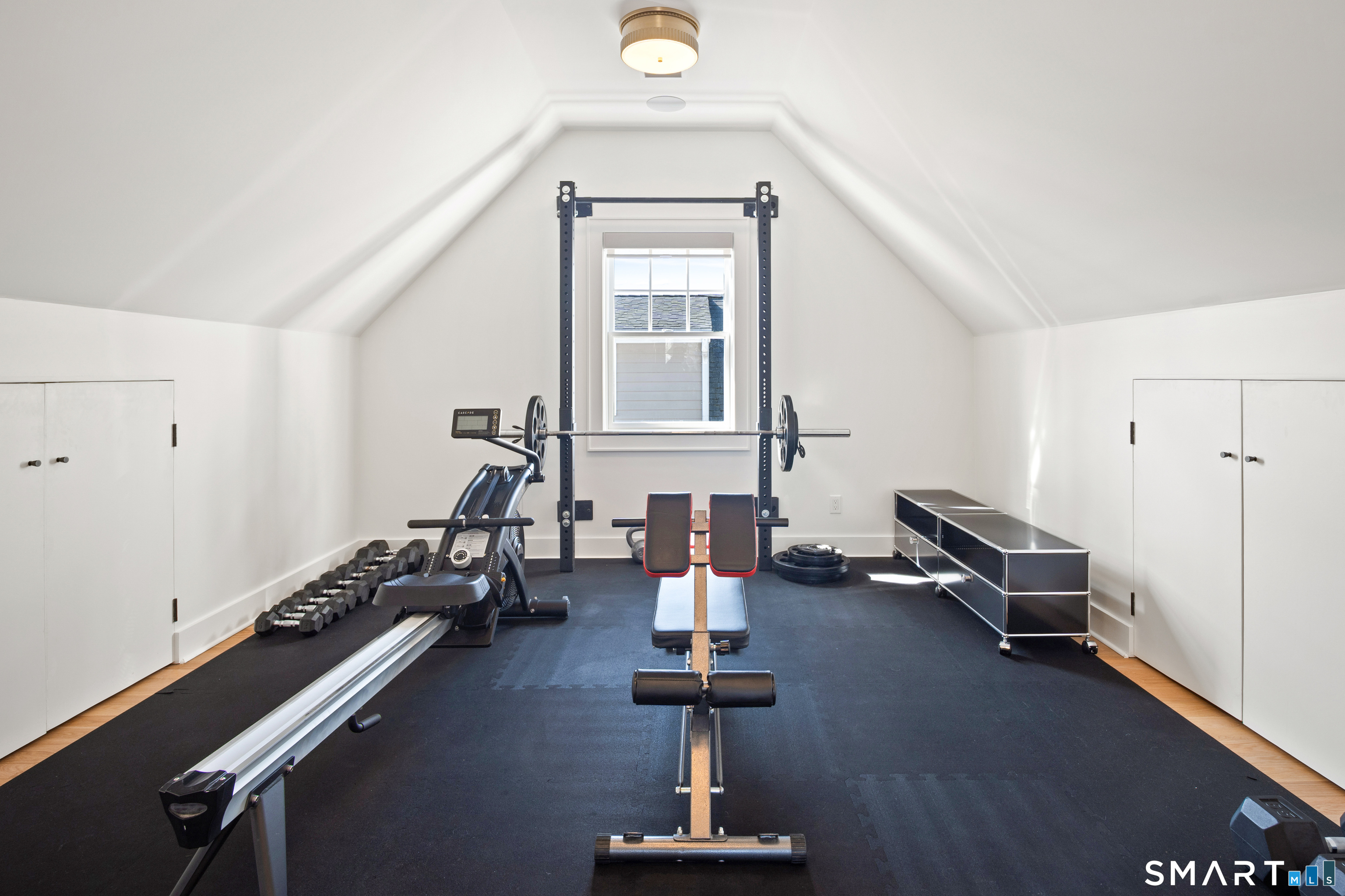 22 Craw Avenue Norwalk, CT 06853 - Photo 34 of 40 a view of a room with gym equipment