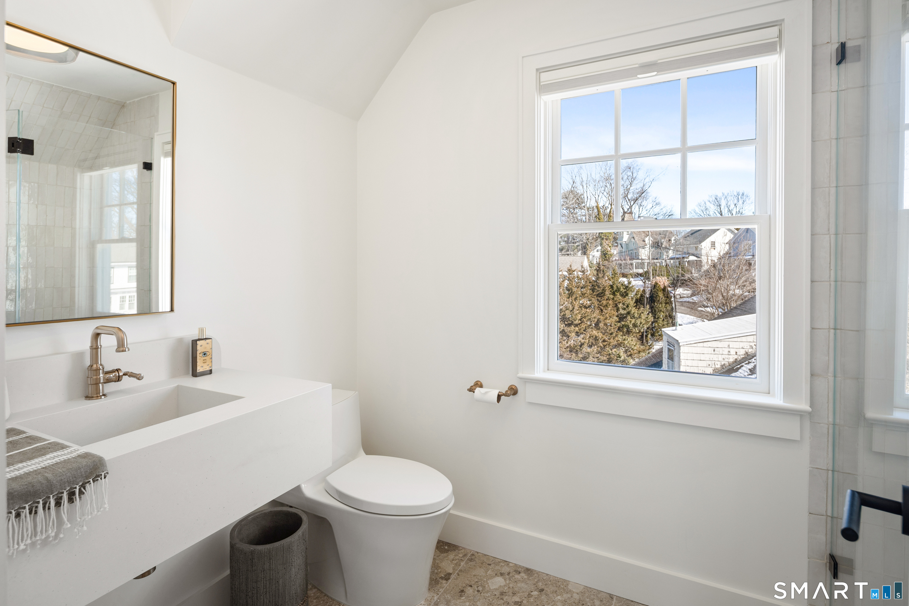 22 Craw Avenue Norwalk, CT 06853 - Photo 36 of 40 a white toilet sitting next to a bathroom sink