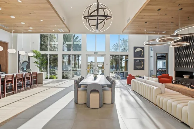 a large living room with large windows