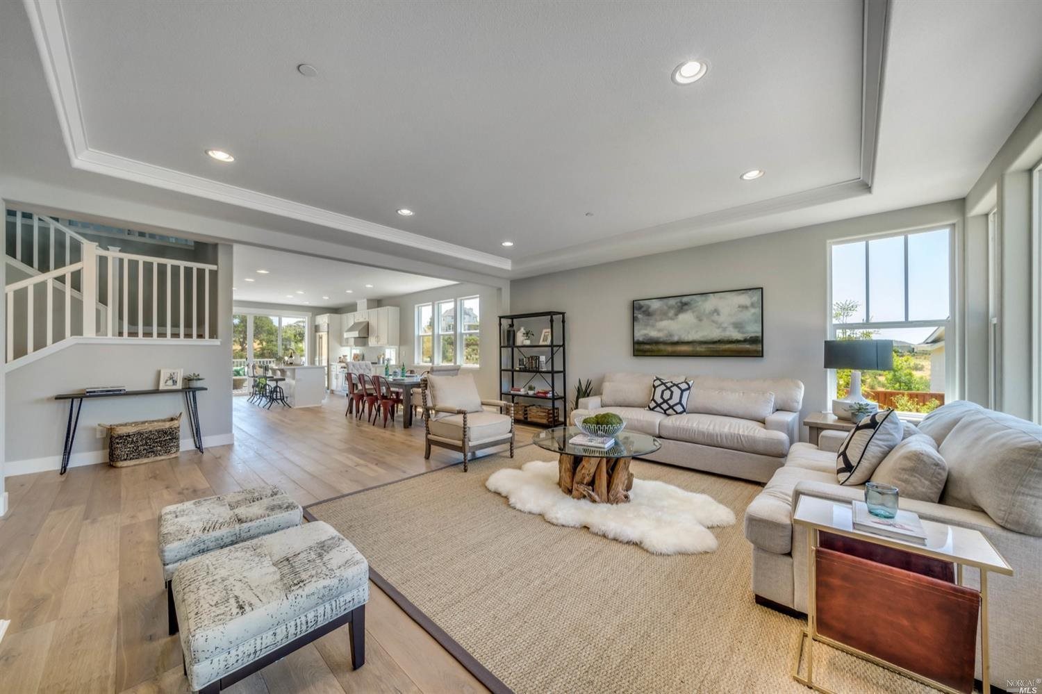 6028 Sunhawk Place Santa Rosa, CA 95409 - Photo 1 of 1 a living room with furniture and a wooden floor