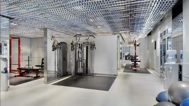 a view of a room with gym equipment
