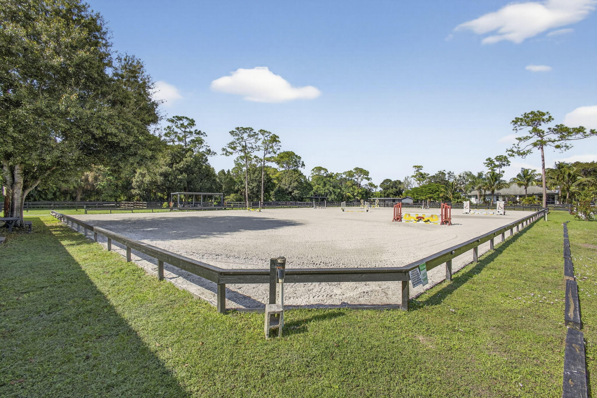 14346 33rd Place North Loxahatchee Groves, FL 33470 - Photo 14 of 40 a view of a swimming pool with a lounge chairs