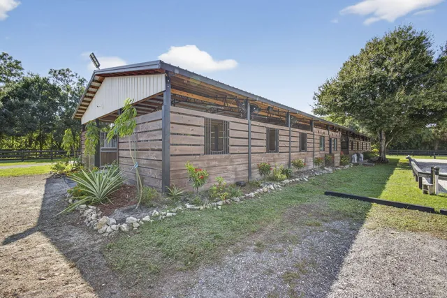 a view of a backyard with a trampoline