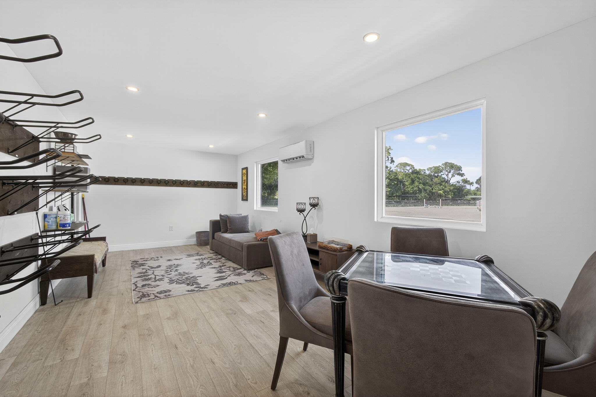 14346 33rd Place North Loxahatchee Groves, FL 33470 - Photo 19 of 40 a view of a dining room with a table and chairs