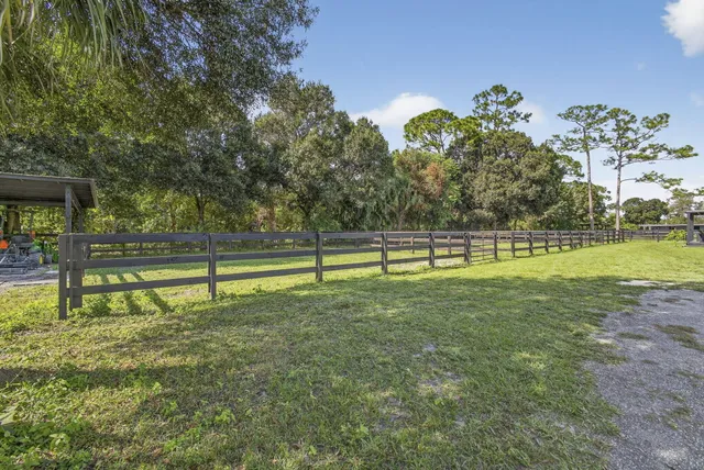 a view of backyard with green space