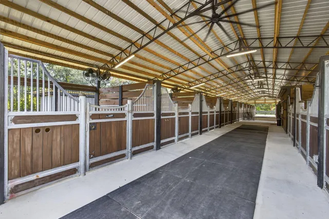 a view of a room with wooden walls