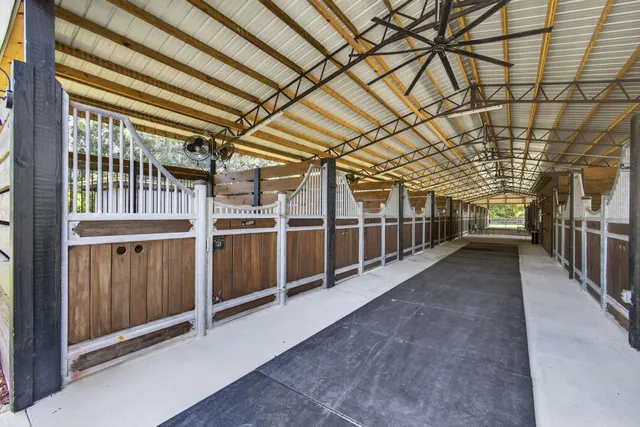 a view of a chairs and table in a patio