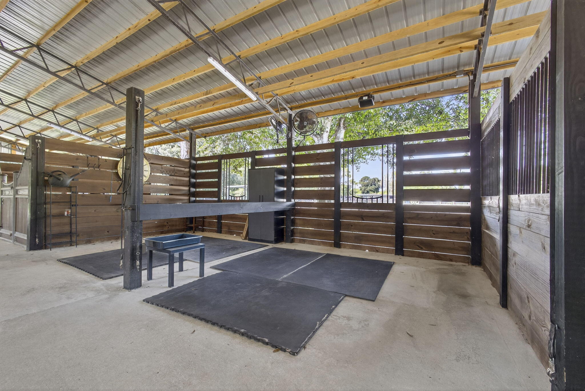 14346 33rd Place North Loxahatchee Groves, FL 33470 - Photo 9 of 40 a view of a chairs and table in a patio