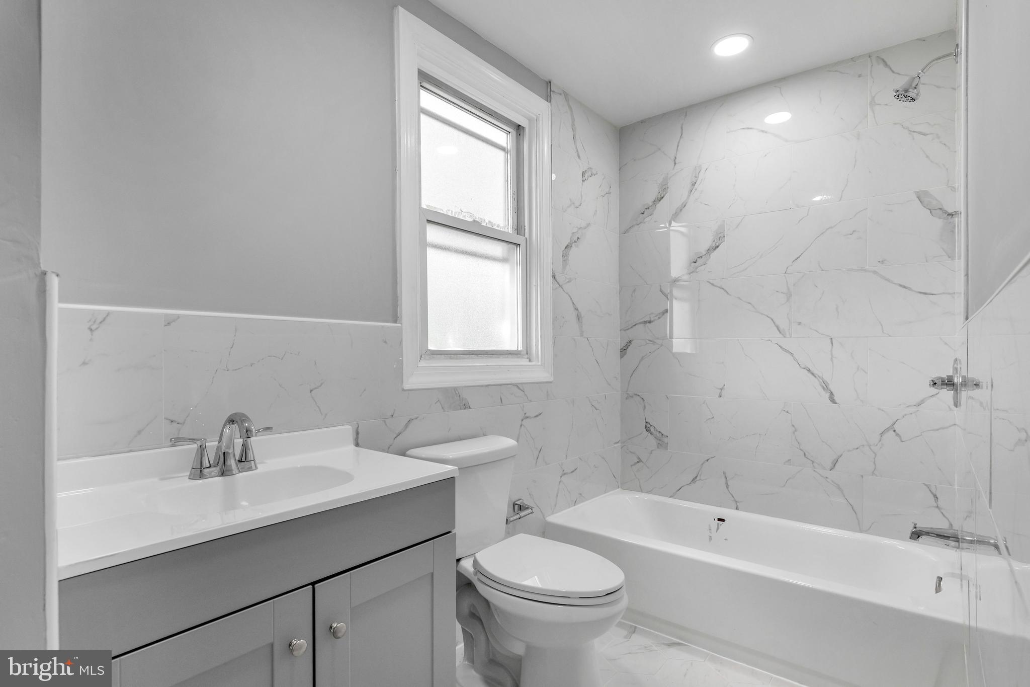 120 Englewood Road Upper Darby, PA 19082 - Photo 18 of 29 a bathroom with a sink toilet tub and shower