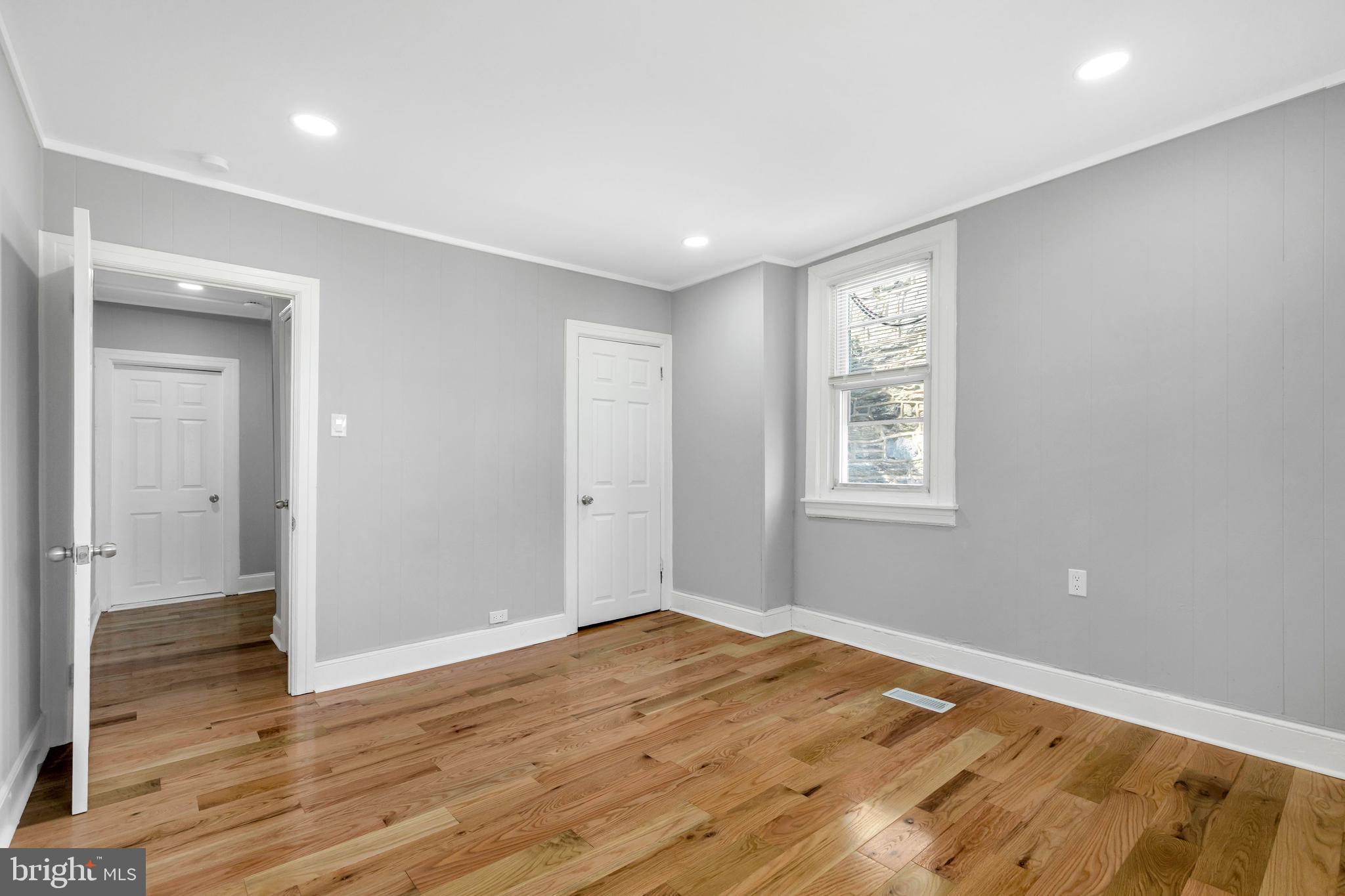 120 Englewood Road Upper Darby, PA 19082 - Photo 21 of 29 a view of empty room with wooden floor