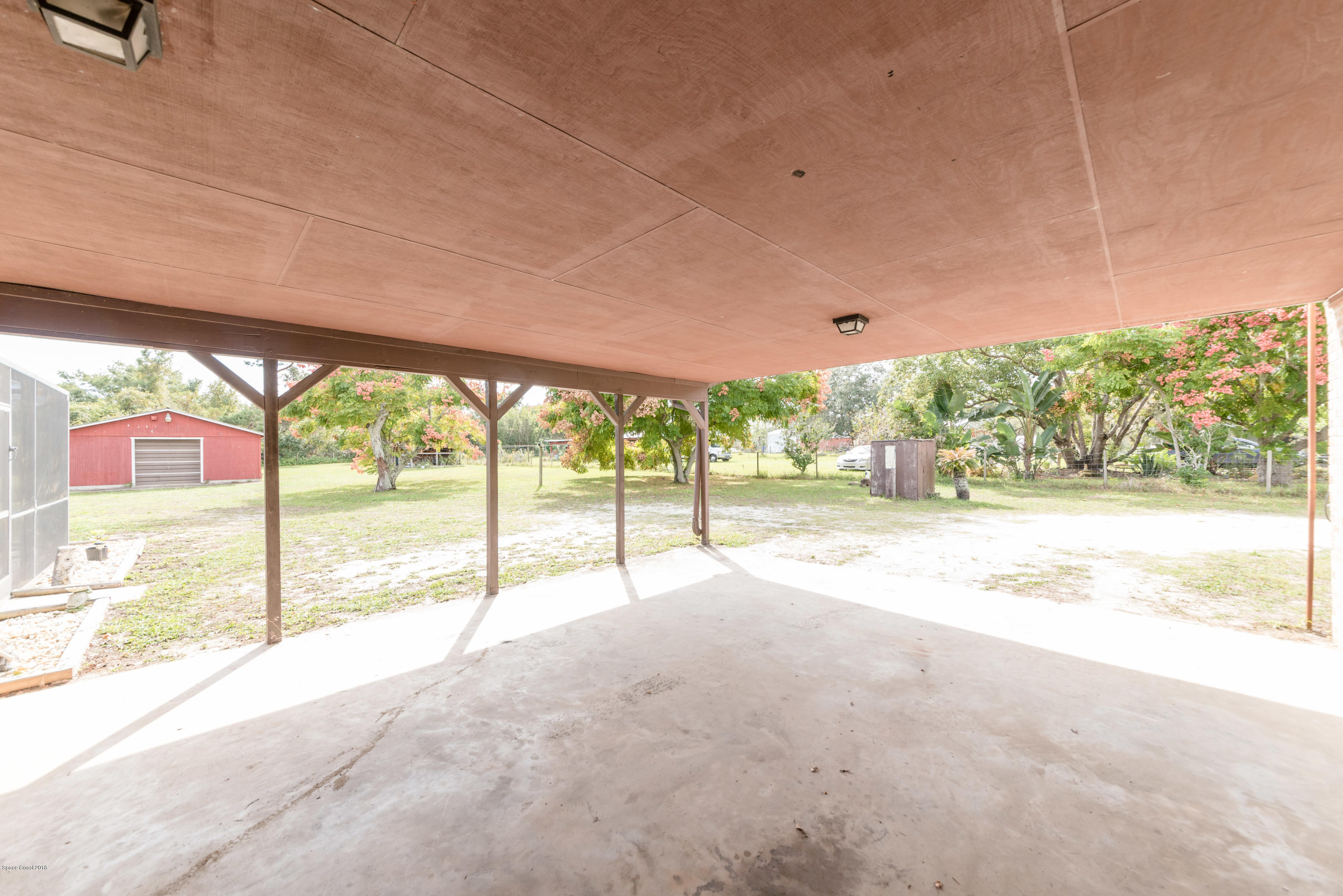 3715 Maebert Road Mims, FL 32754 - Photo 28 of 34 Carport View Out