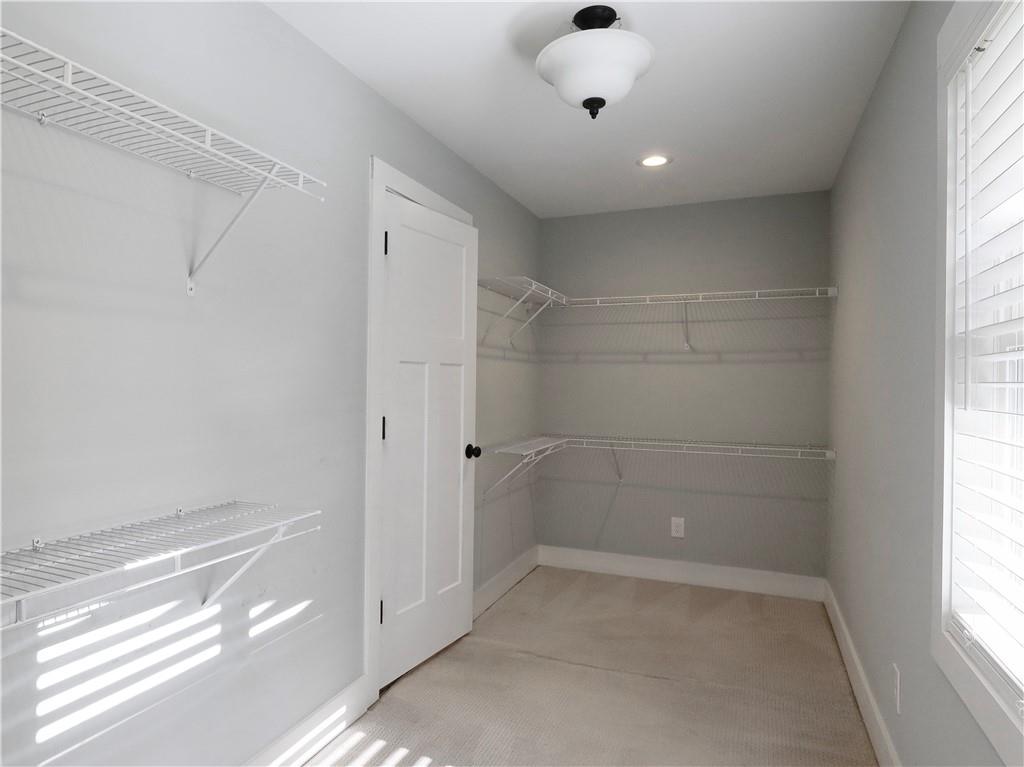 4925 Cook Road Southwest Stockbridge, GA 30281 - Photo 26 of 32 a view of a small space with a window and a ceiling fan