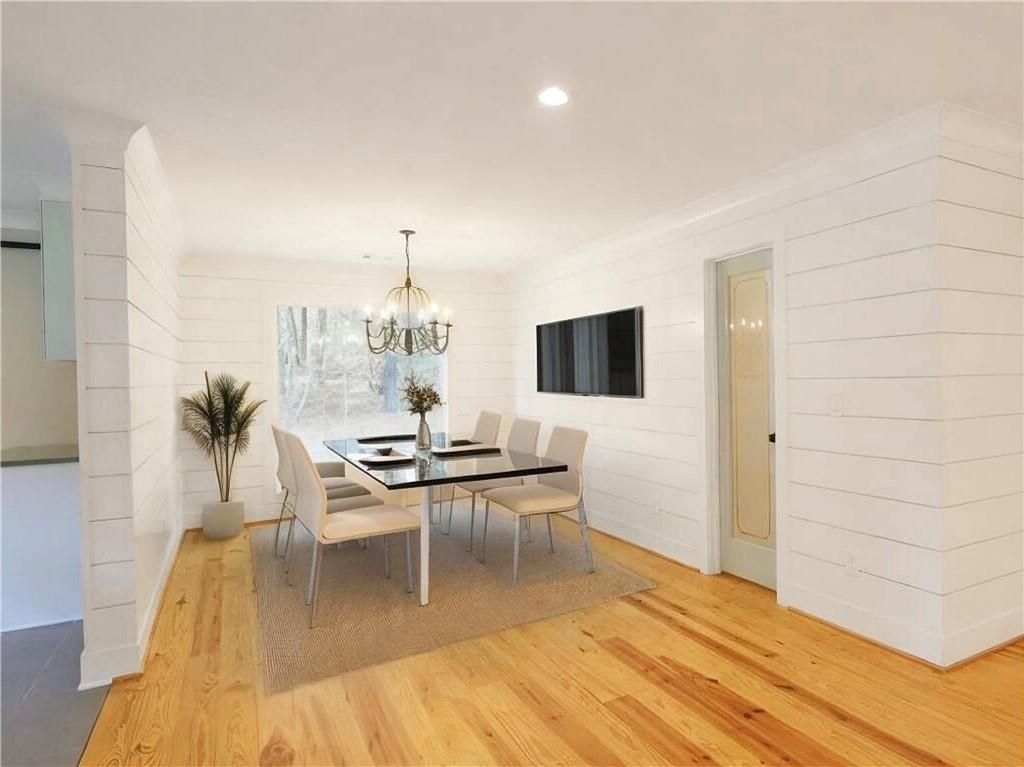 4925 Cook Road Southwest Stockbridge, GA 30281 - Photo 7 of 32 a living room with furniture and a flat screen tv