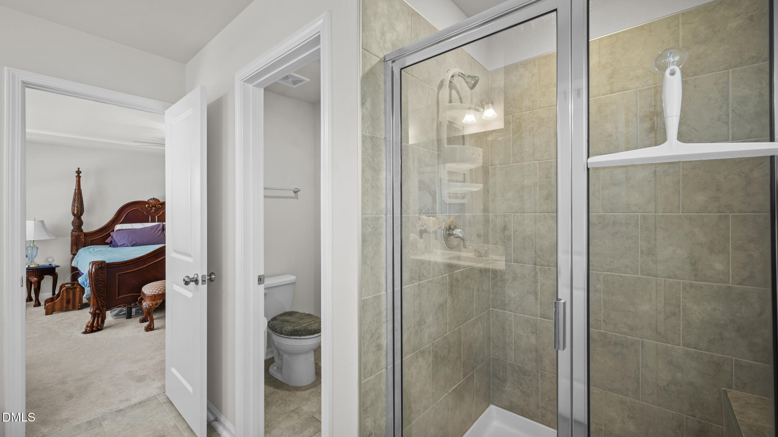 333 Glacier Lk Drive Raleigh, NC 27610 - Photo 19 of 32 a bathroom with a shower