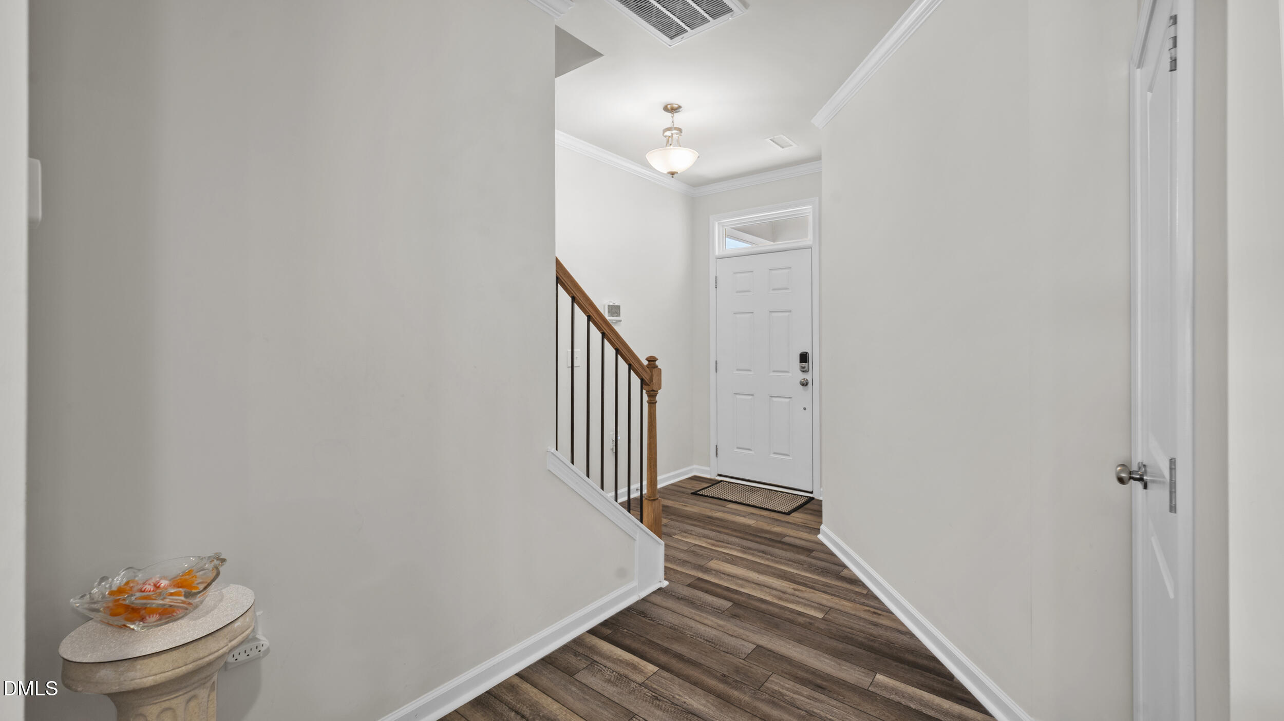 333 Glacier Lk Drive Raleigh, NC 27610 - Photo 8 of 32 a view of a hallway with stairs