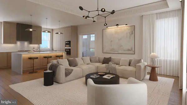 a living room with furniture and a chandelier