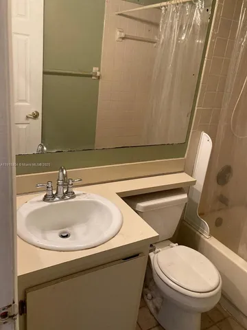 a view of a room with windows