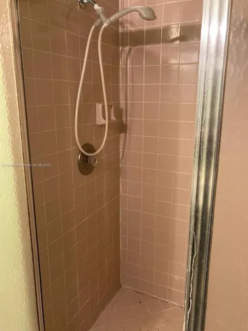 a view of a room with a window