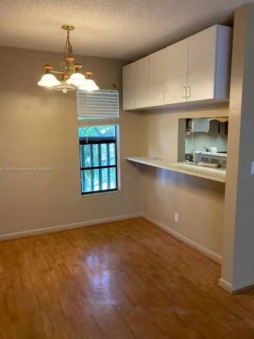 a view of kitchen and window