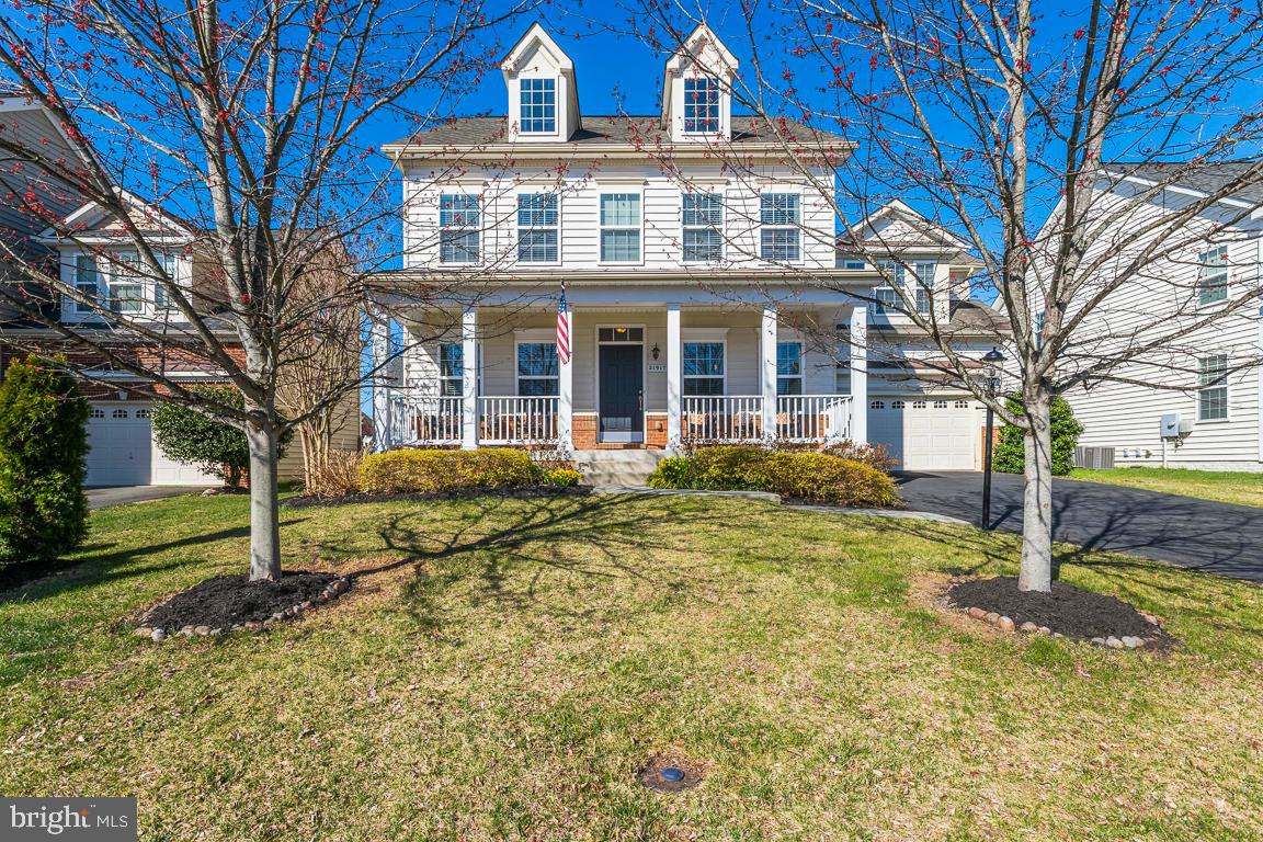 21917 Providence Forge Drive Ashburn, VA 20148 - Photo 1 of 44 a view of a house with a yard