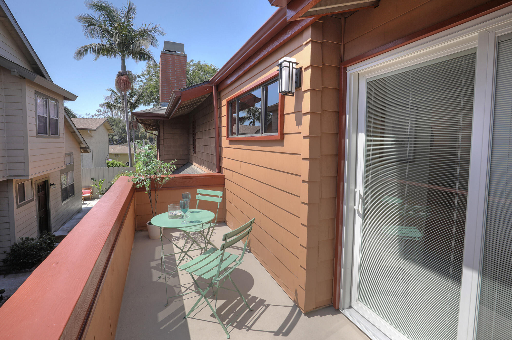 1815 Bath Street, Unit 4 Santa Barbara, CA 93101 - Photo 13 of 19 a balcony with table and chairs