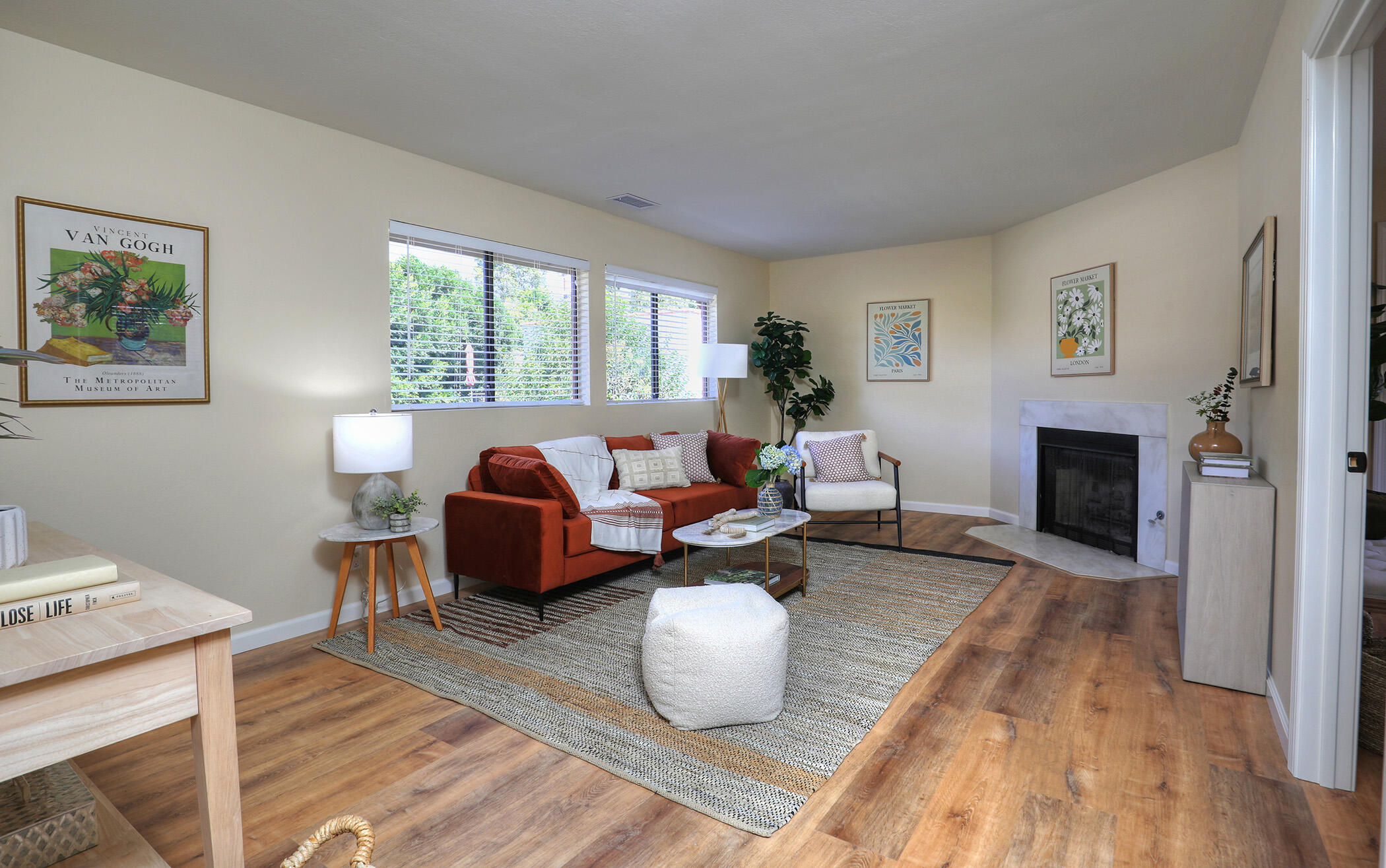 1815 Bath Street, Unit 4 Santa Barbara, CA 93101 - Photo 6 of 19 a living room with furniture and a wooden floor