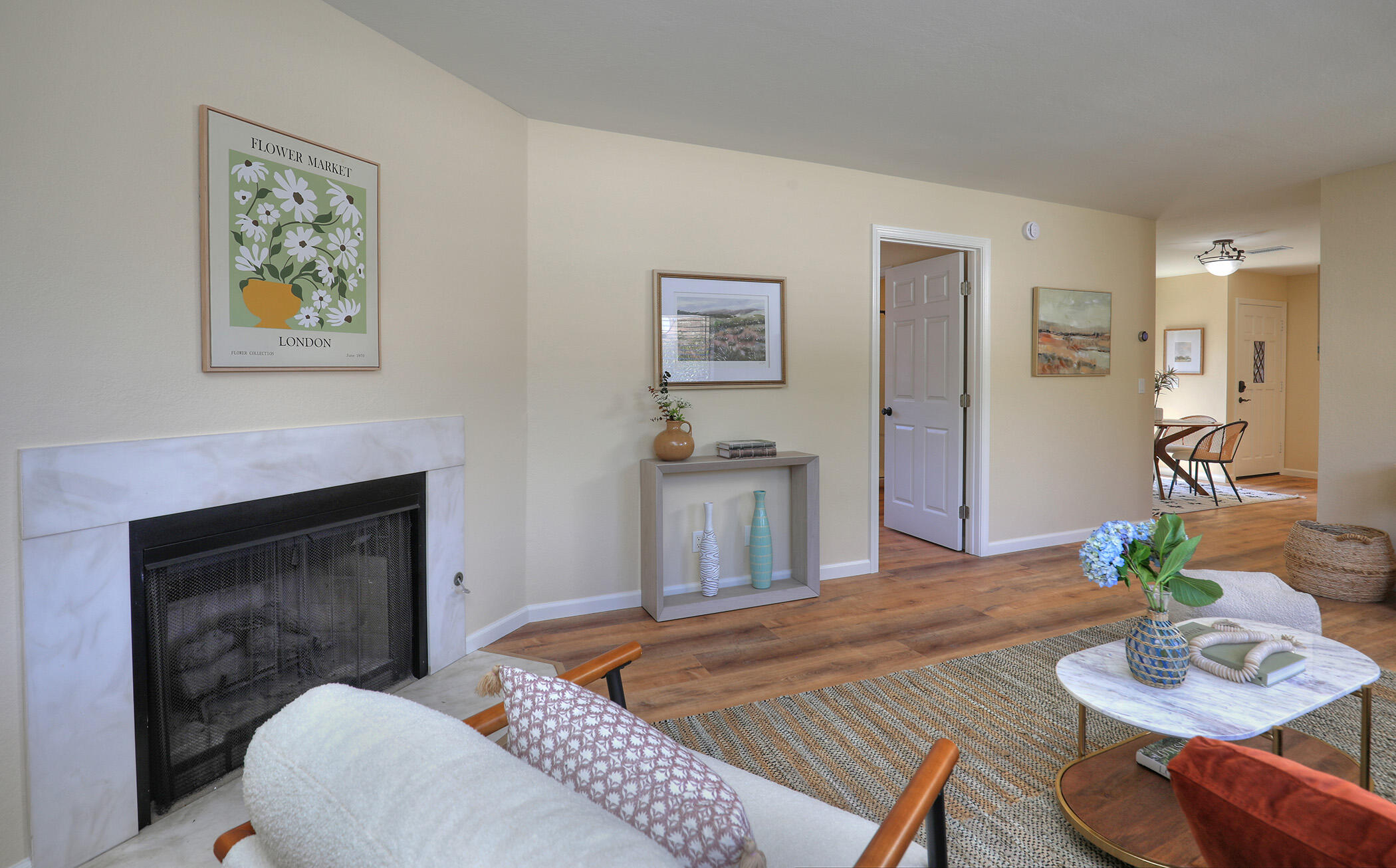 1815 Bath Street, Unit 4 Santa Barbara, CA 93101 - Photo 7 of 19 a living room with furniture and a fireplace