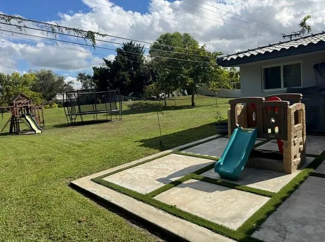a view of a park with slide