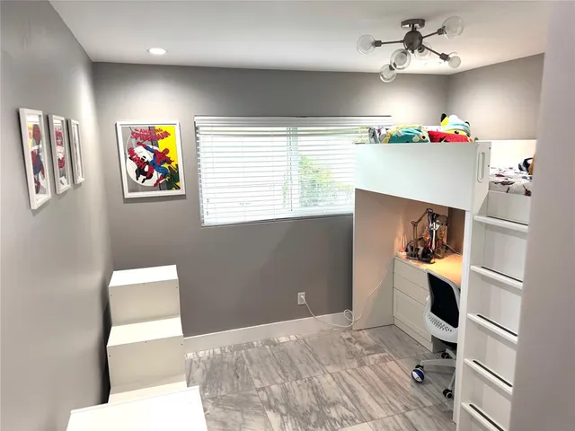 a view of a livingroom with a staircase