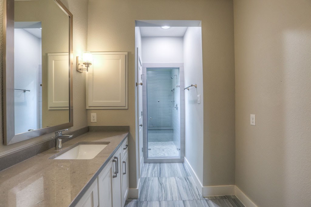 3619 Alba Road Houston, TX 77018 - Photo 23 of 34 2nd floor-Primary bedroom ensuite bathroom w/ walk in shower and dual vanity