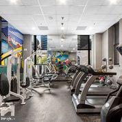 7 North Calvert Street, Unit 1BR Baltimore, MD 21202 - Photo 12 of 32 a view of a room with gym equipment