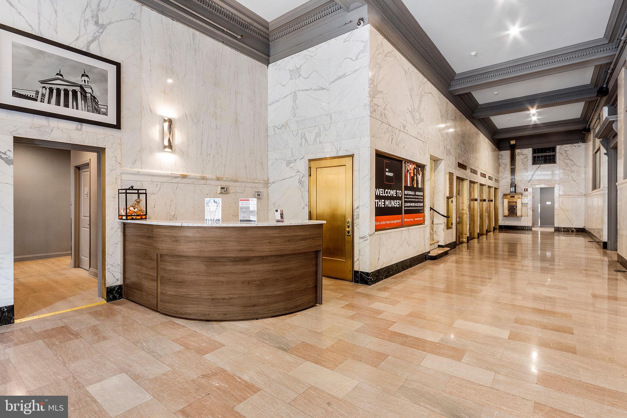 7 North Calvert Street, Unit 1BR Baltimore, MD 21202 - Photo 17 of 32 a view of a lobby with furniture