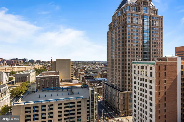 a city view with tall buildings