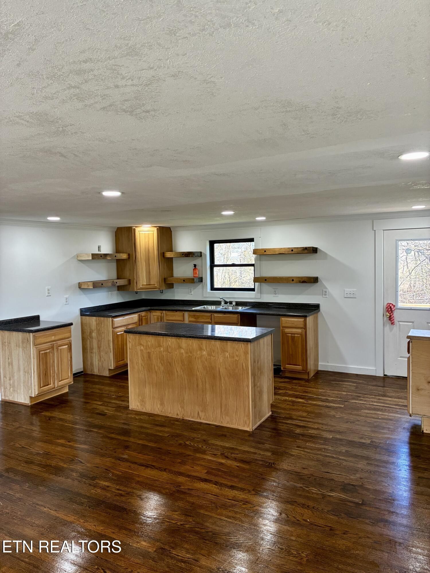 101 Steele Road Greenback, TN 37742 - Photo 5 of 22 a kitchen with stainless steel appliances granite countertop a sink and a stove