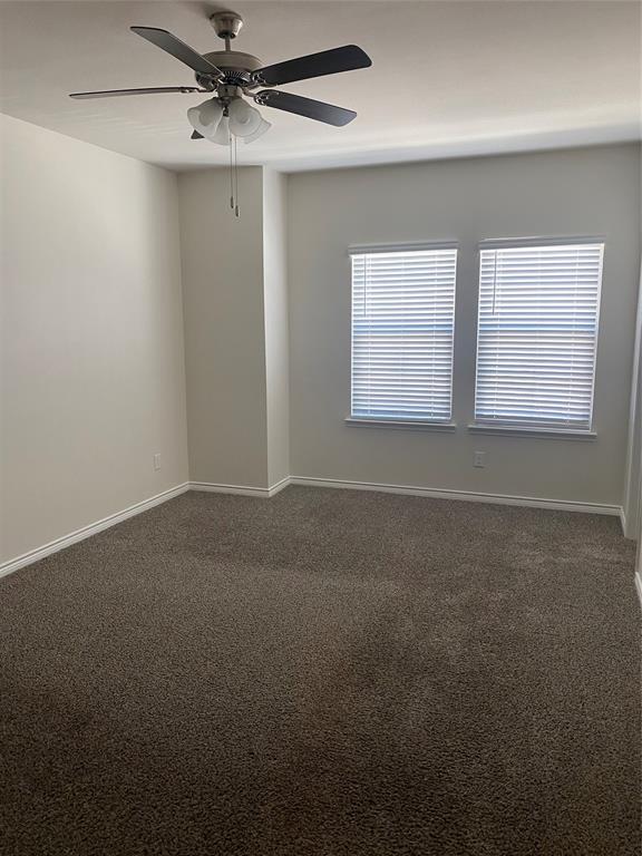 2157 Crooked Bow Drive, Unit 2157 Mesquite, TX 75149 - Photo 2 of 8 a view of a window in an empty room