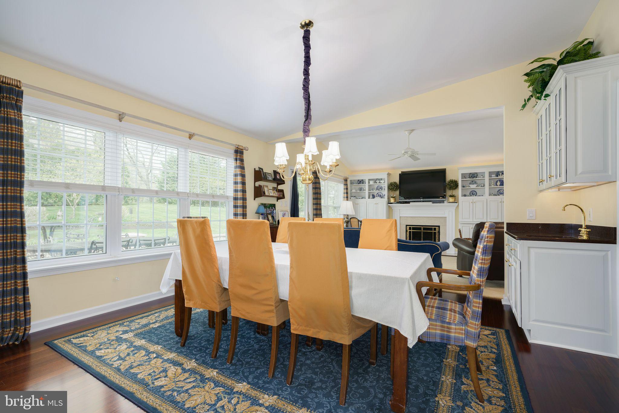 624 Warwick Road Haddonfield, NJ 08033 - Photo 11 of 43 a view of a dining room with furniture window and wooden floor