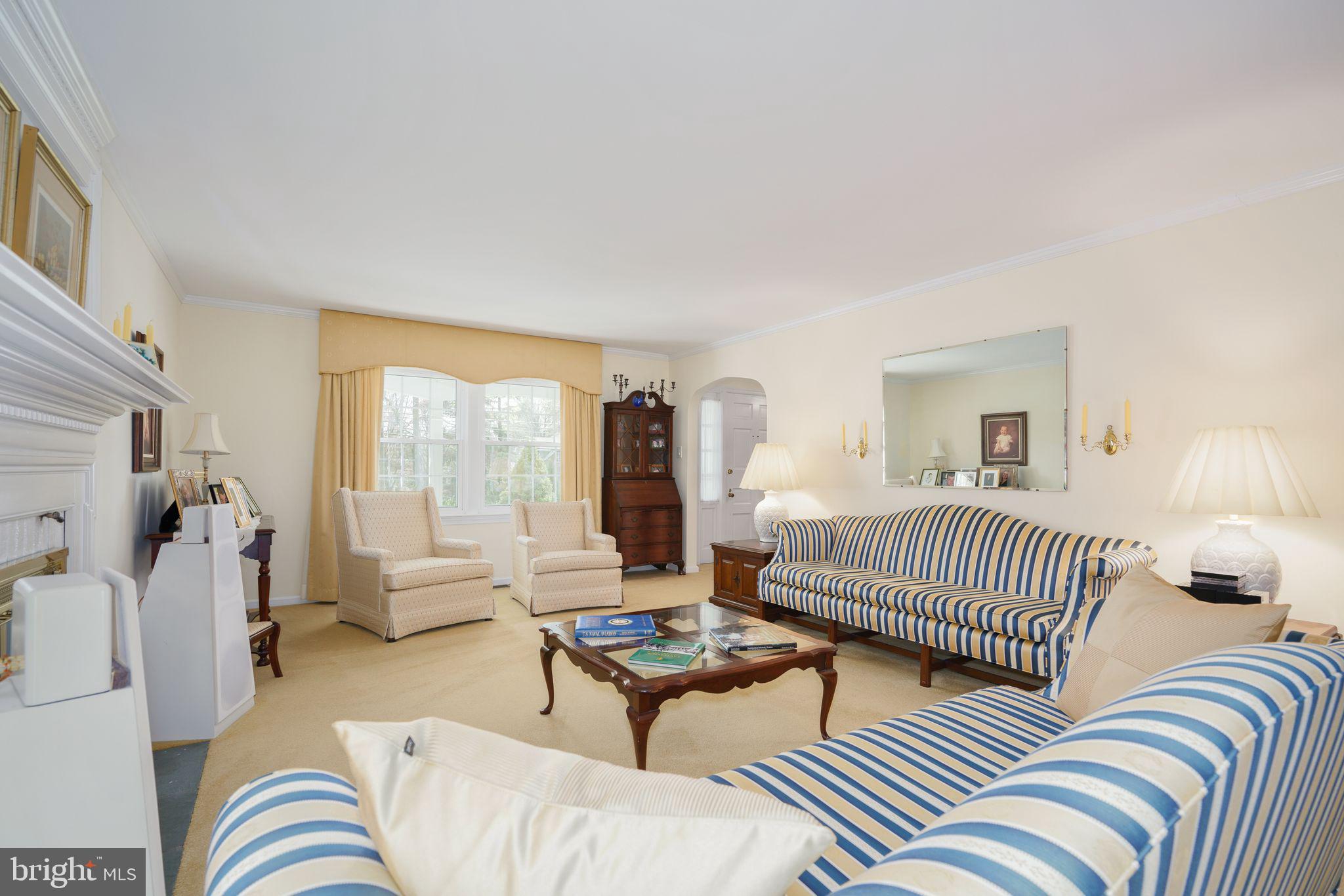 624 Warwick Road Haddonfield, NJ 08033 - Photo 17 of 43 a living room with furniture and a large window
