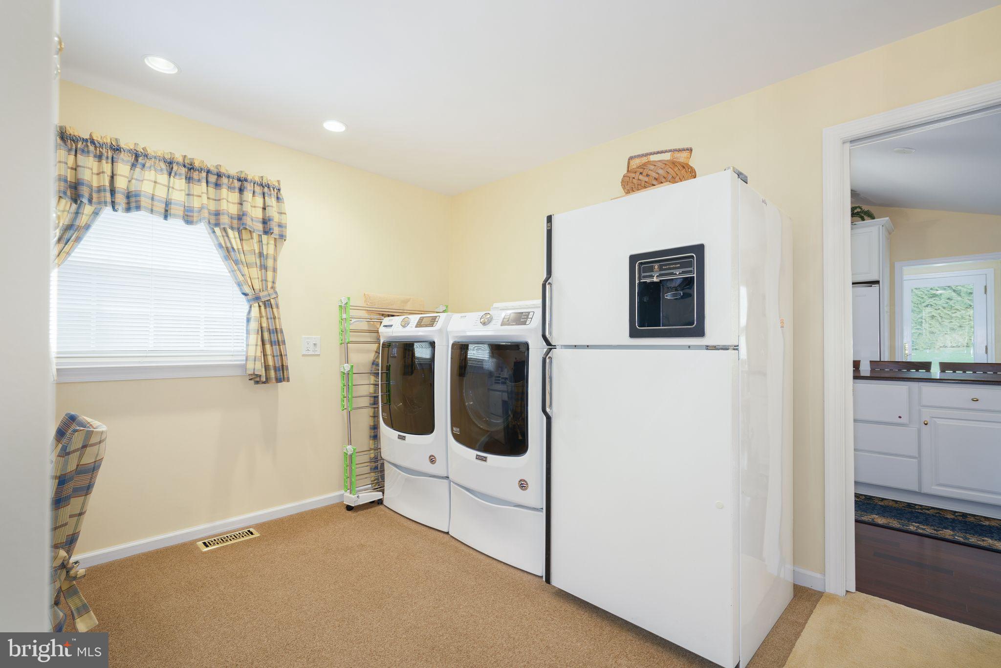 624 Warwick Road Haddonfield, NJ 08033 - Photo 25 of 43 a utility room with dryer and washer