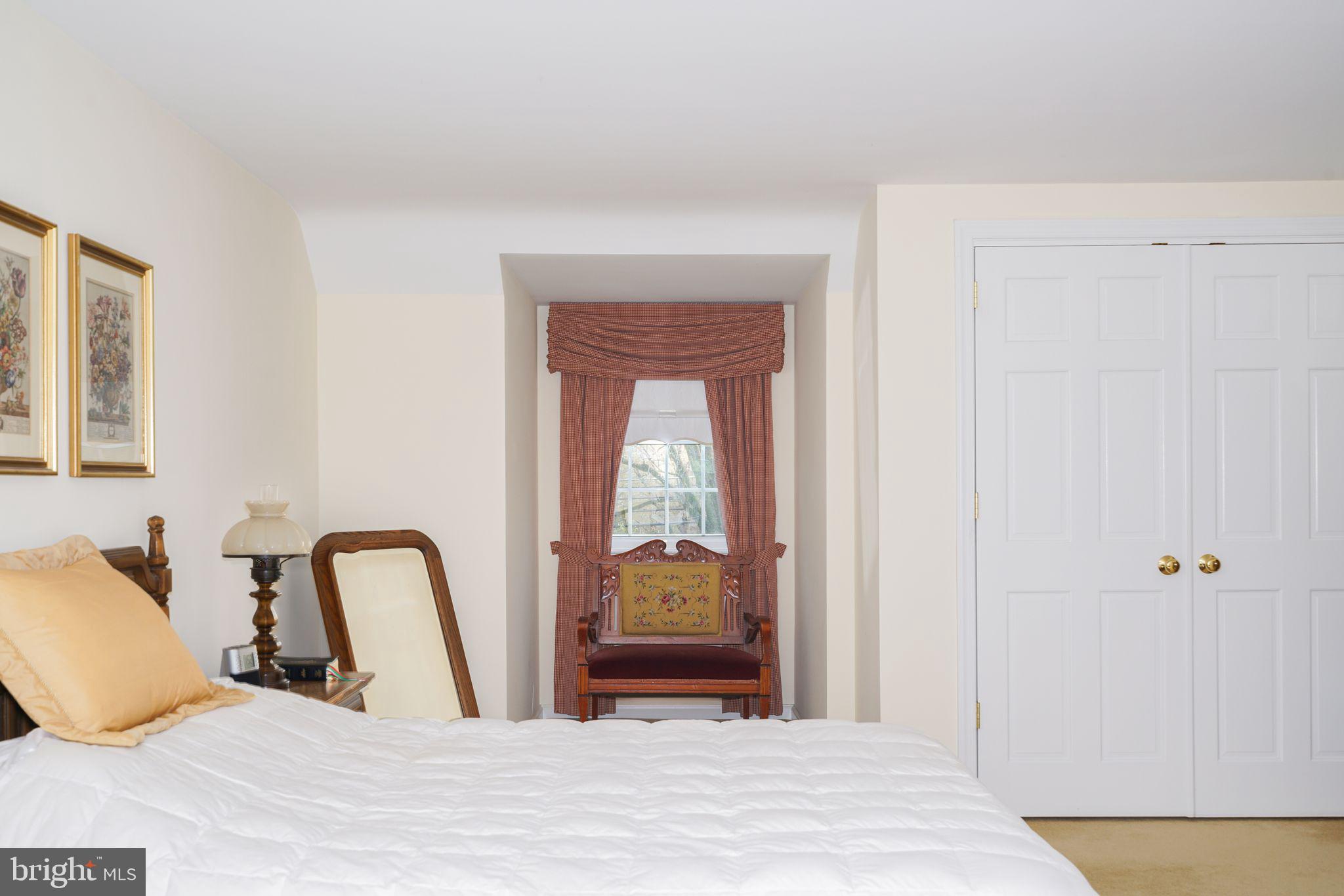 624 Warwick Road Haddonfield, NJ 08033 - Photo 30 of 43 a bedroom with a bed and window