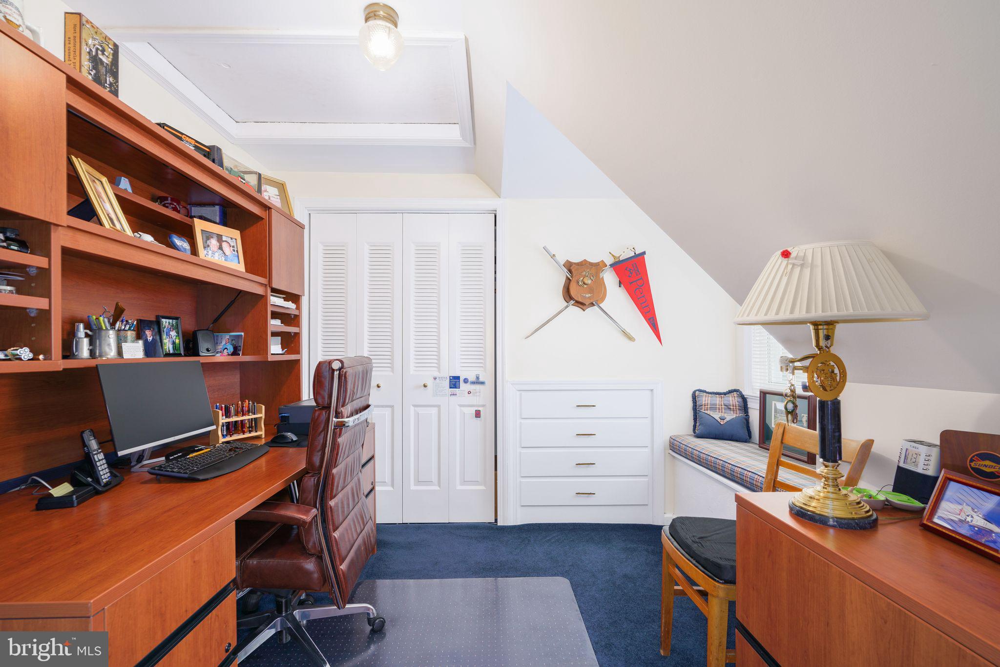 624 Warwick Road Haddonfield, NJ 08033 - Photo 36 of 43 a view of a workspace with furniture and wooden floor